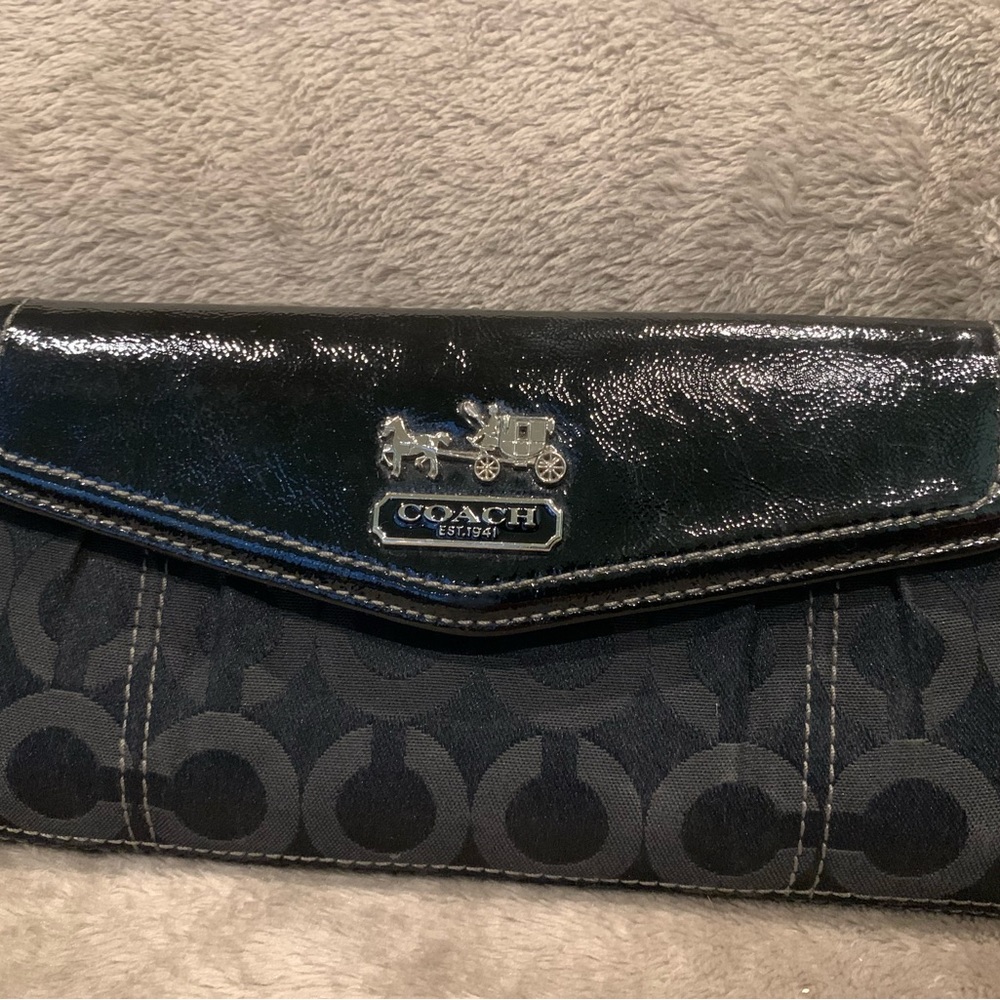 Coach Signature black wallet with purple interior